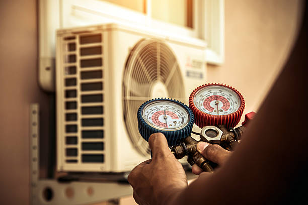 Professional Heat Pump Repair technician working in Rowley, MA